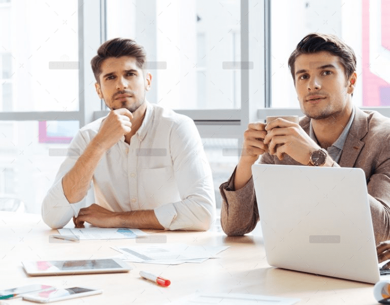 demo-attachment-1127-business-people-sitting-and-listening-at-PC6N3N4@2x
